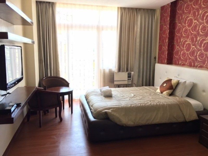 OYO 159 San Remigio Pensionne Suites Cebu Extérieur photo